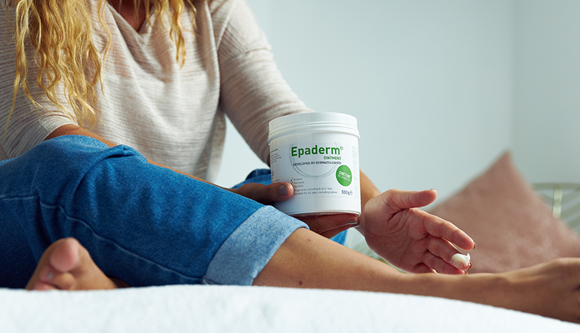 Women on bed using Epaderm Ointment